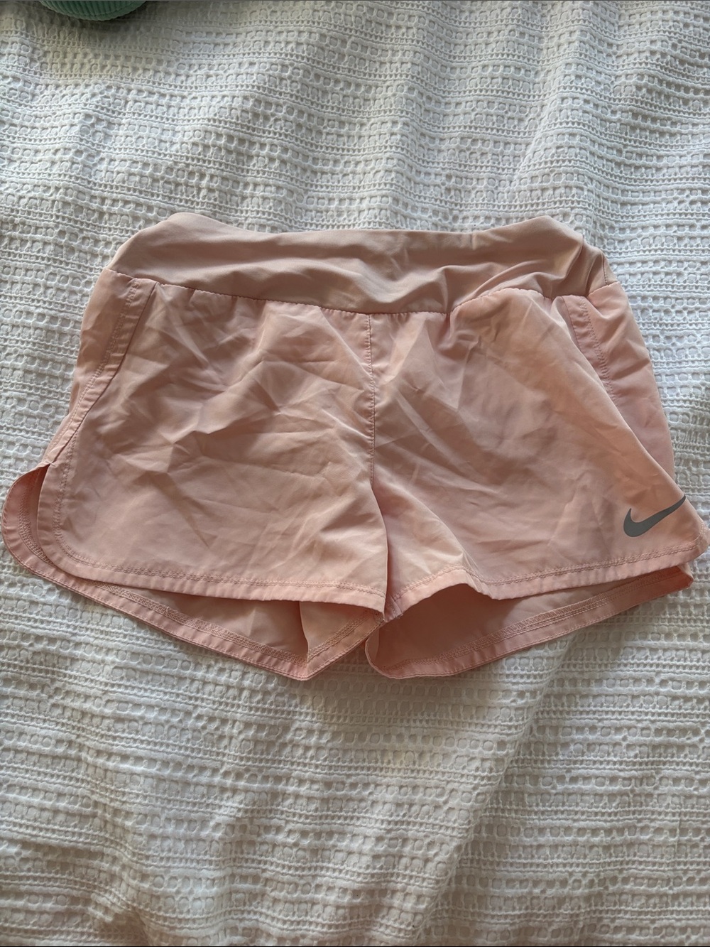 Nike Women's Light Pink Athletic Shorts with Reflective Swoosh